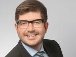 Dr. Christian Happ